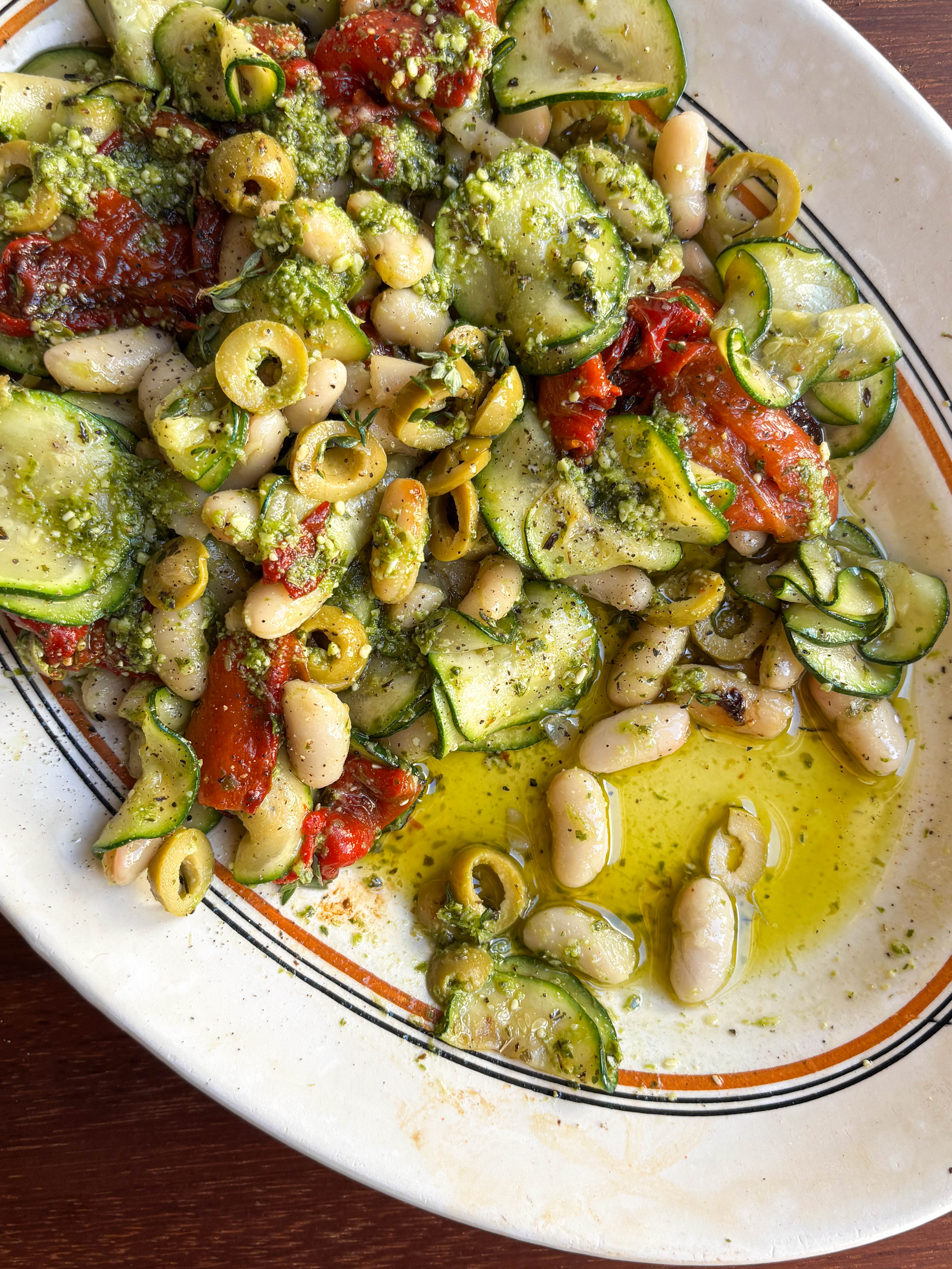 Ratatouille-Style Salad with Pesto Beans, Roasted Red Peppers + Courgettes