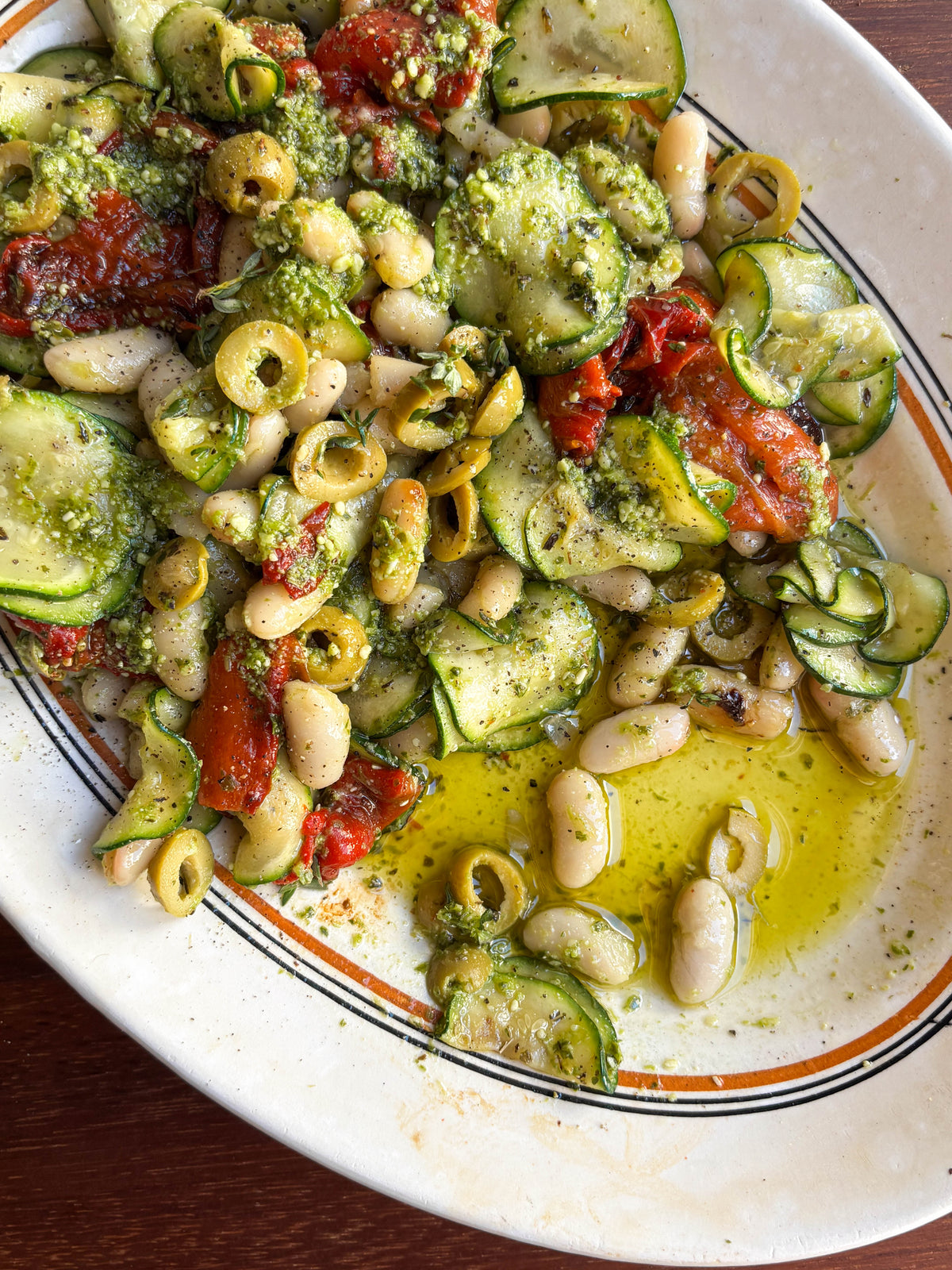 Ratatouille-Style Salad with Pesto Beans, Roasted Red Peppers + Courgettes