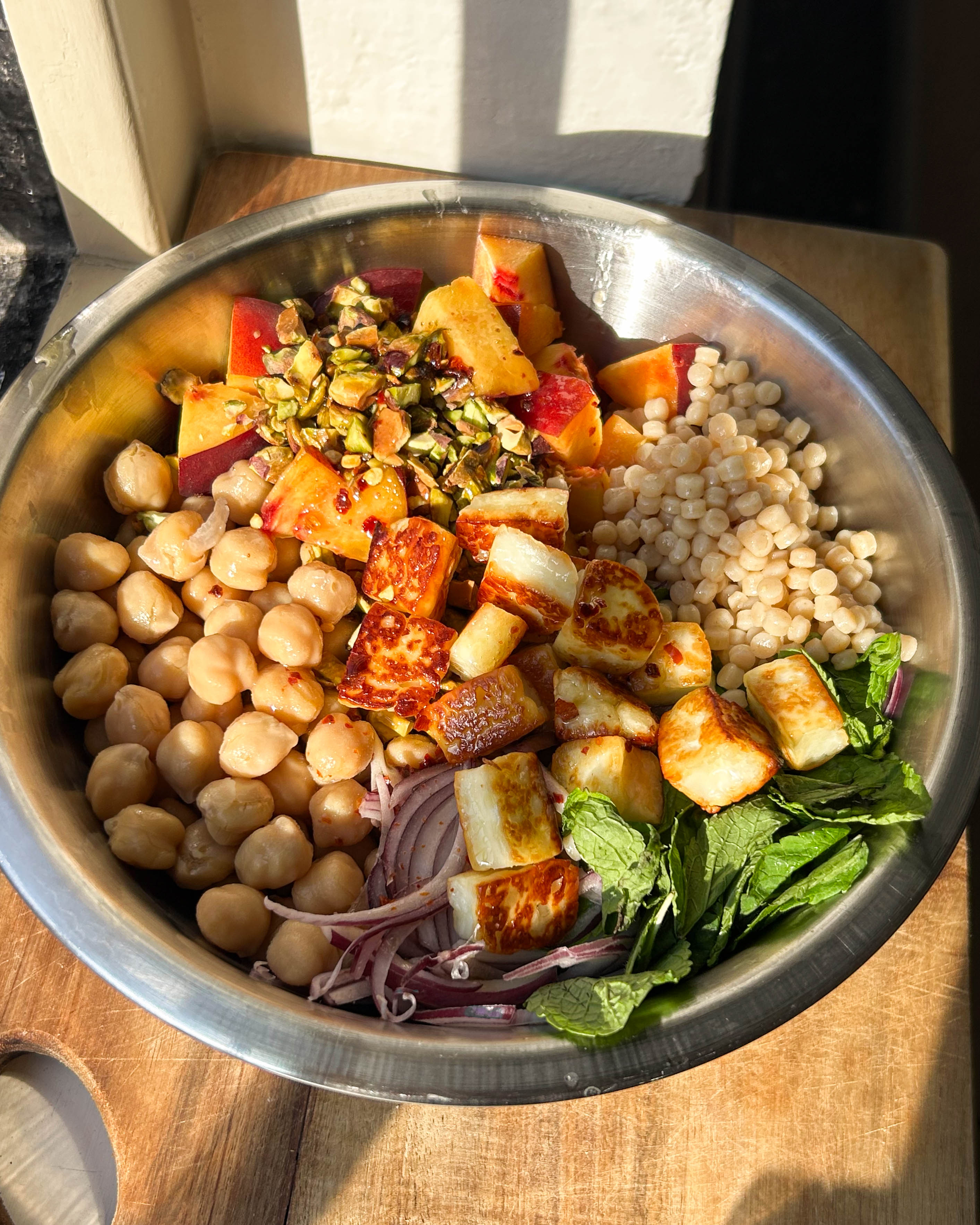 Hot Honey Halloumi, Peach, Chickpea + Pearl Couscous Salad