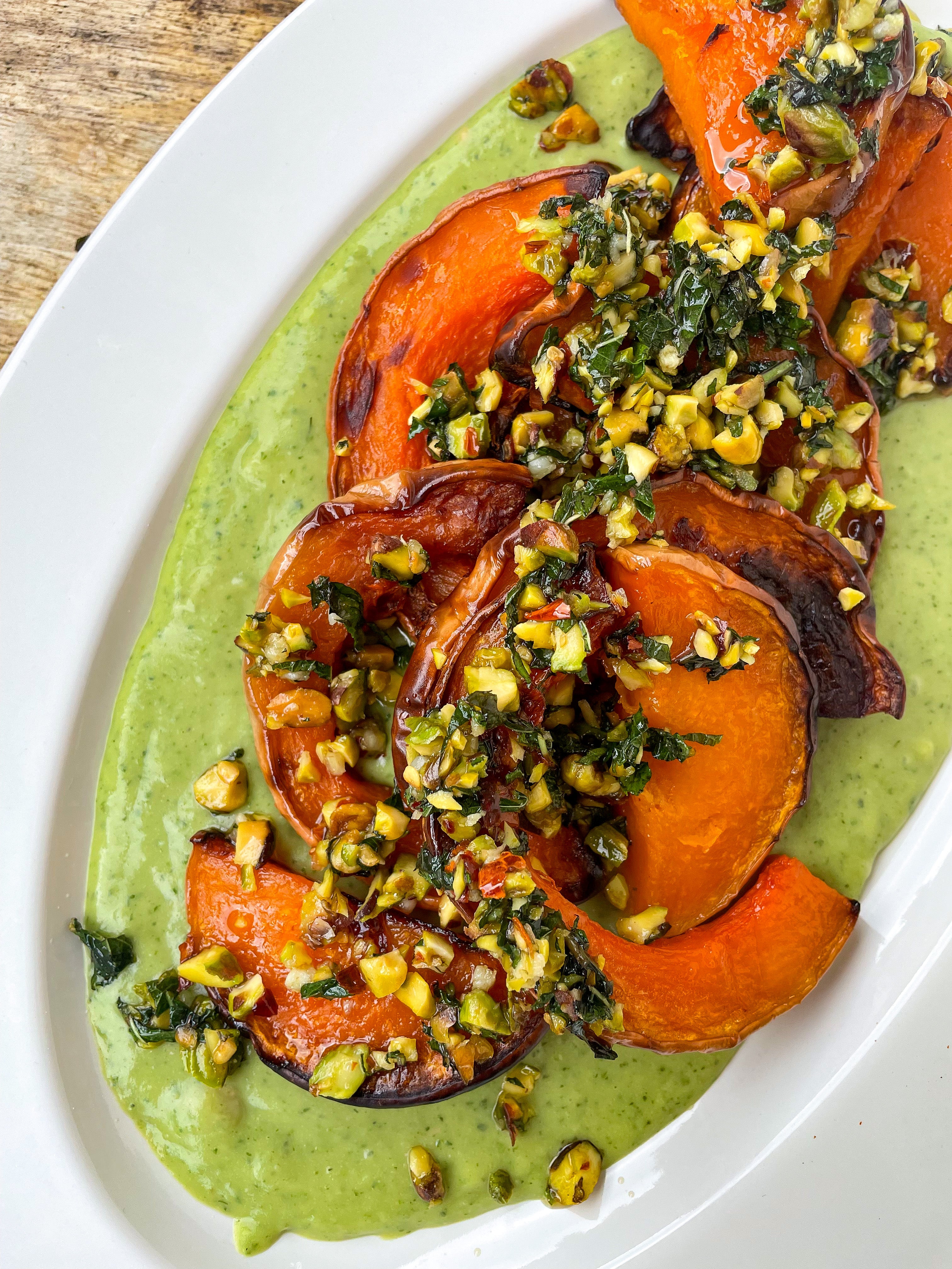 Roast Acorn Squash on Herbed White Bean Mash with Chilli, Mint + Pistachio Butter Bold Bean Co