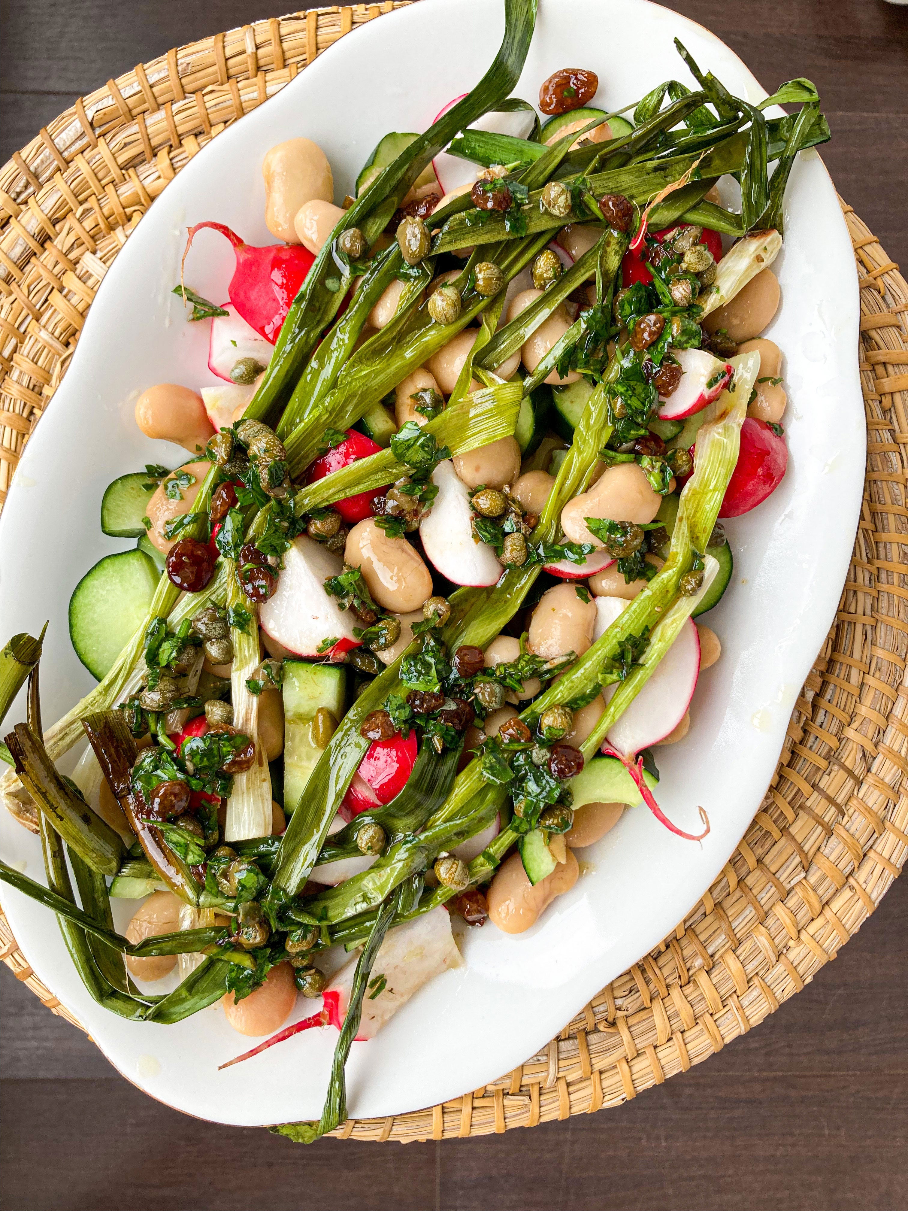 SWEET & SOUR BUTTER BEAN, RADISH + GRILLED SPRING ONION SALAD Bold Bean Co