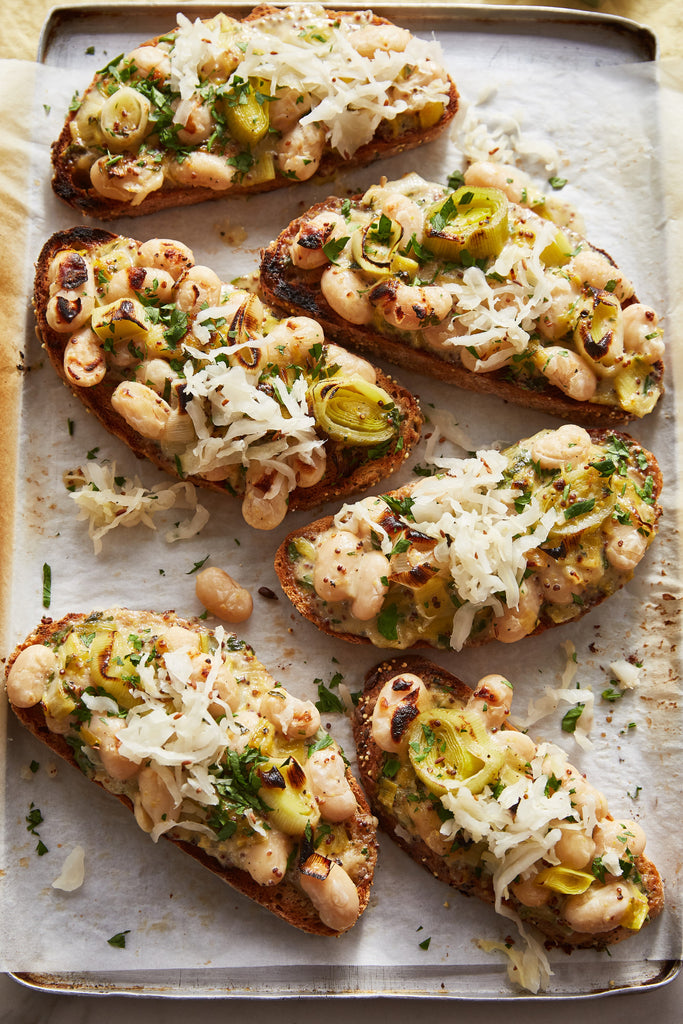Creamy Leeks + Butter Bean Toasts with Sauerkraut