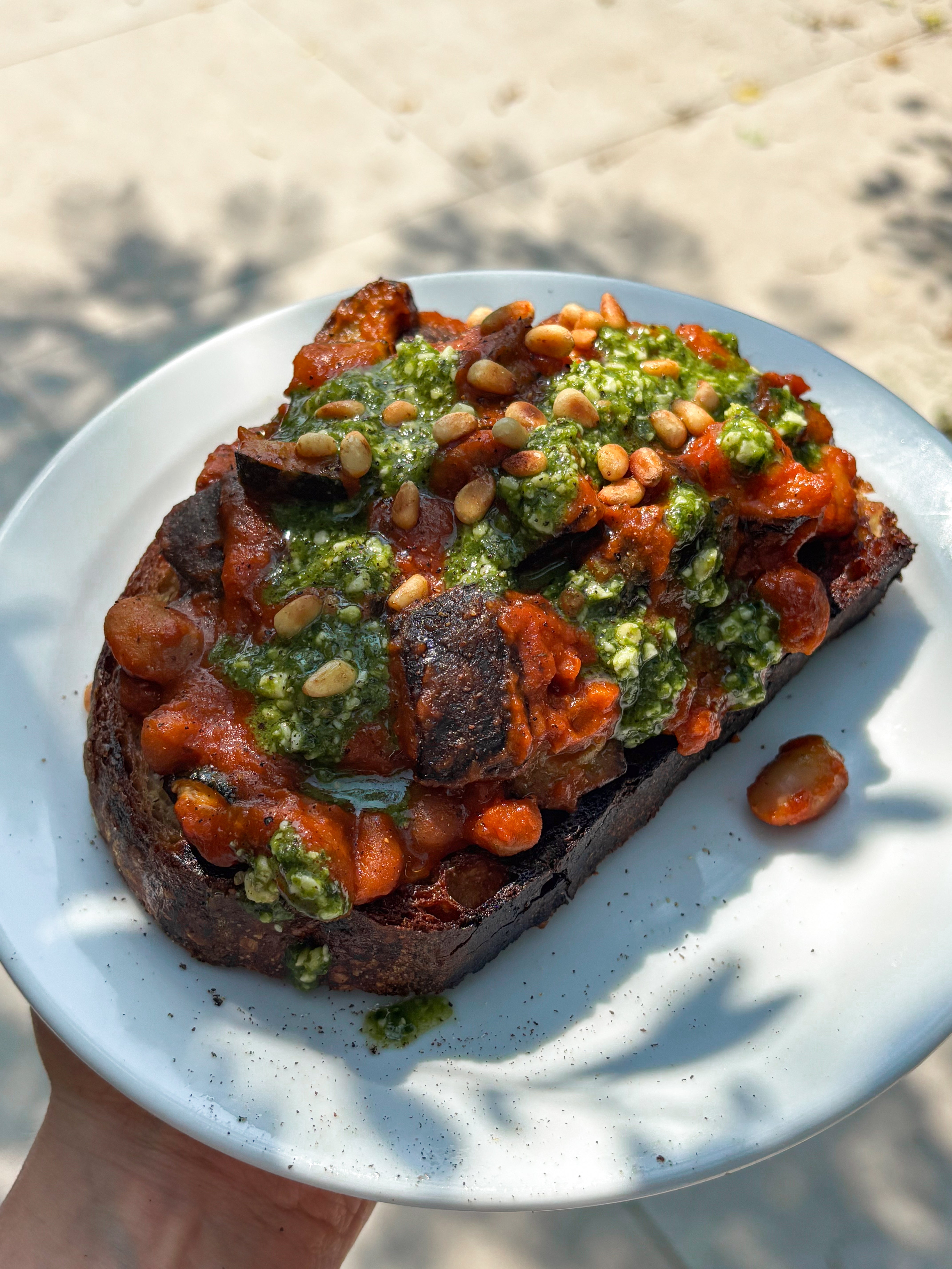 Rich Tomato Baked Beans with Mediterranean Veg + Pesto