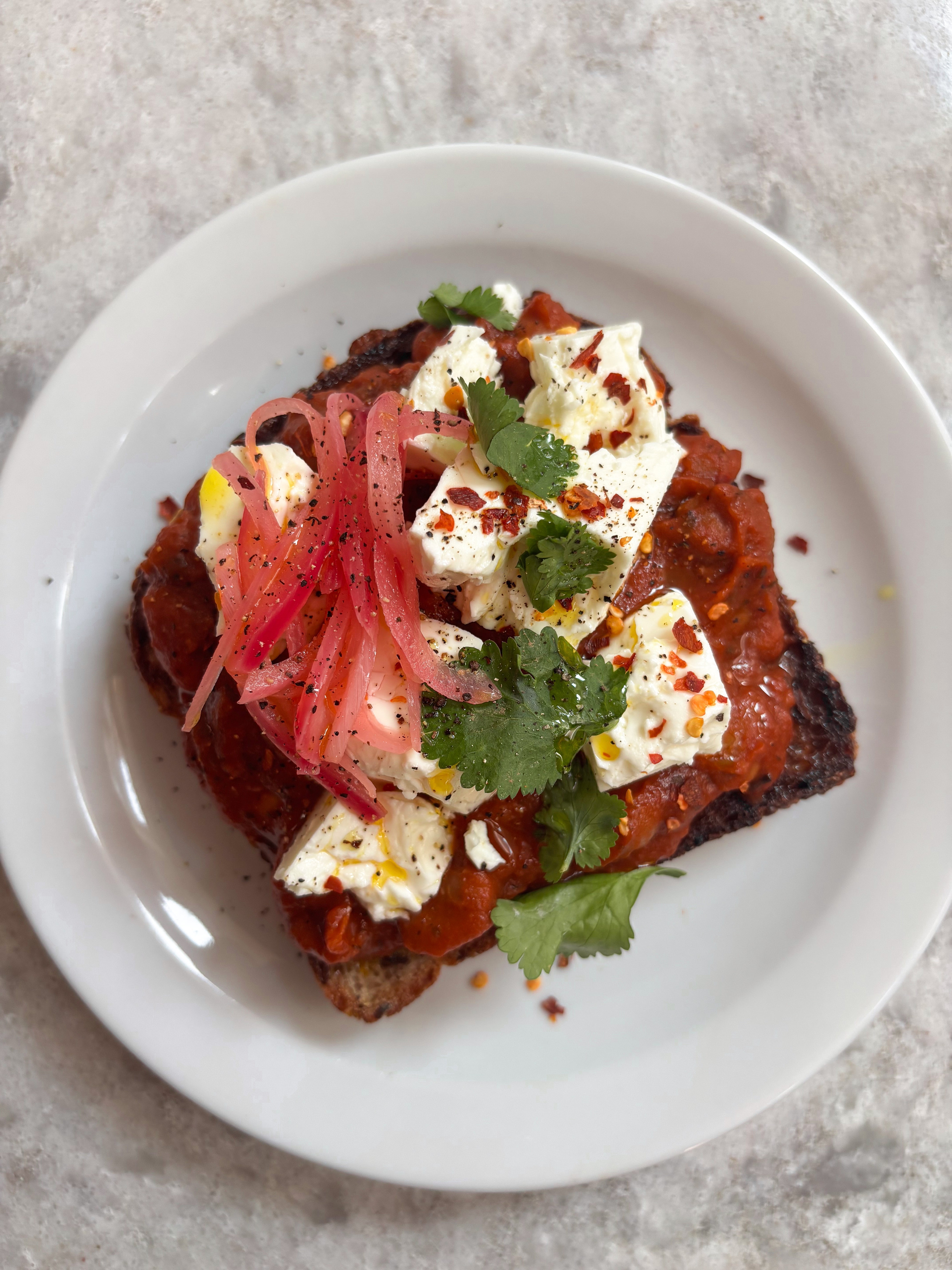 Smoky Chilli Baked Beans with Feta, Pickled Red Onion + Fresh Coriander