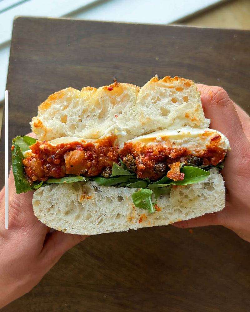Smashed Nudja Chickpea + Stracciatella Sandwich with Crispy Capers